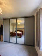 2 dust grey panel doors and 2 mirror doors all in charcoal frames, installed in Spennymoor